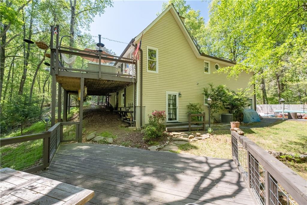 511 Oakdale Road Canton, GA 30114 - Photo 37 of 50 a view of a house with backyard