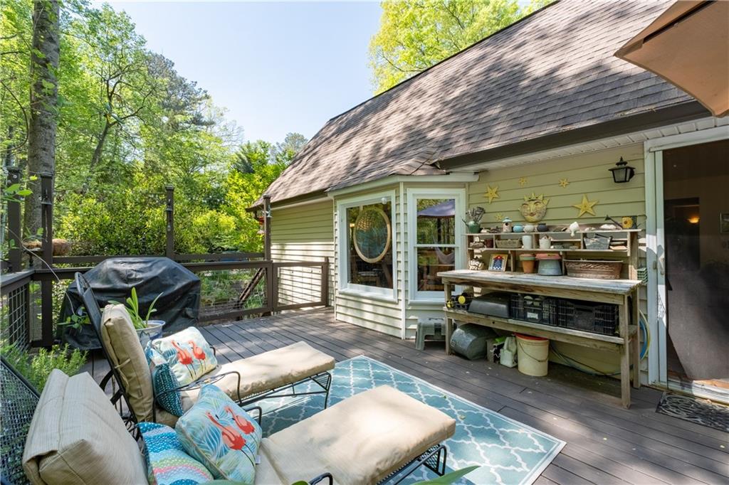 511 Oakdale Road Canton, GA 30114 - Photo 42 of 50 a view of outdoor sitting area with furniture and wooden floor