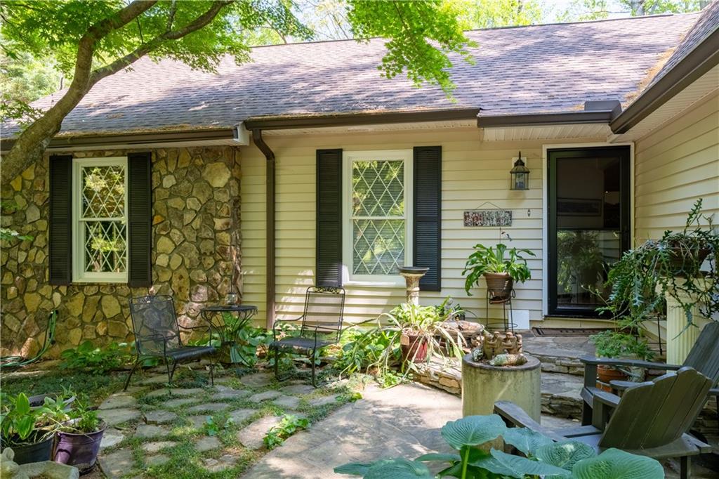 511 Oakdale Road Canton, GA 30114 - Photo 48 of 50 a front view of a house with a porch