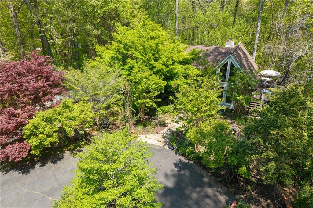 511 Oakdale Road Canton, GA 30114 - Photo 50 of 50 a backyard of a house with a yard and outdoor seating