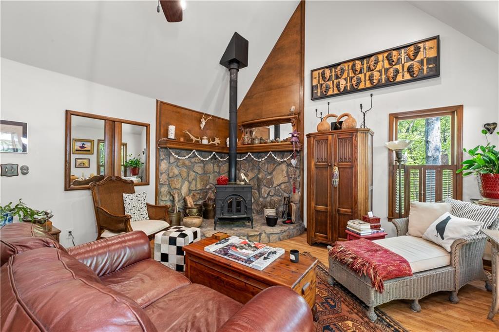 511 Oakdale Road Canton, GA 30114 - Photo 10 of 50 a bedroom with furniture and a fireplace