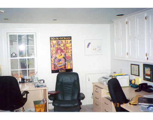 91 Concord Road Acton, MA 01720 - Photo 12 of 12 a workspace with furniture and a window
