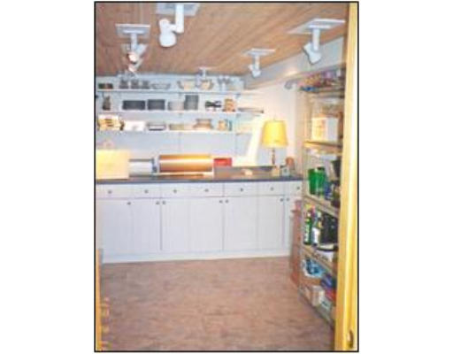 91 Concord Road Acton, MA 01720 - Photo 6 of 12 a view of a kitchen with a sink
