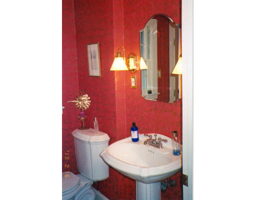 91 Concord Road Acton, MA 01720 - Photo 7 of 12 a bathroom with a sink toilet and mirror