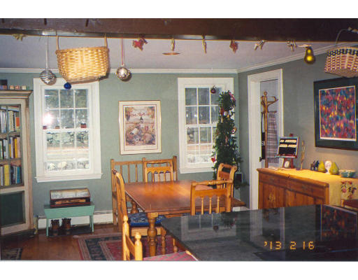 91 Concord Road Acton, MA 01720 - Photo 10 of 12 a living room with furniture and a flat screen tv