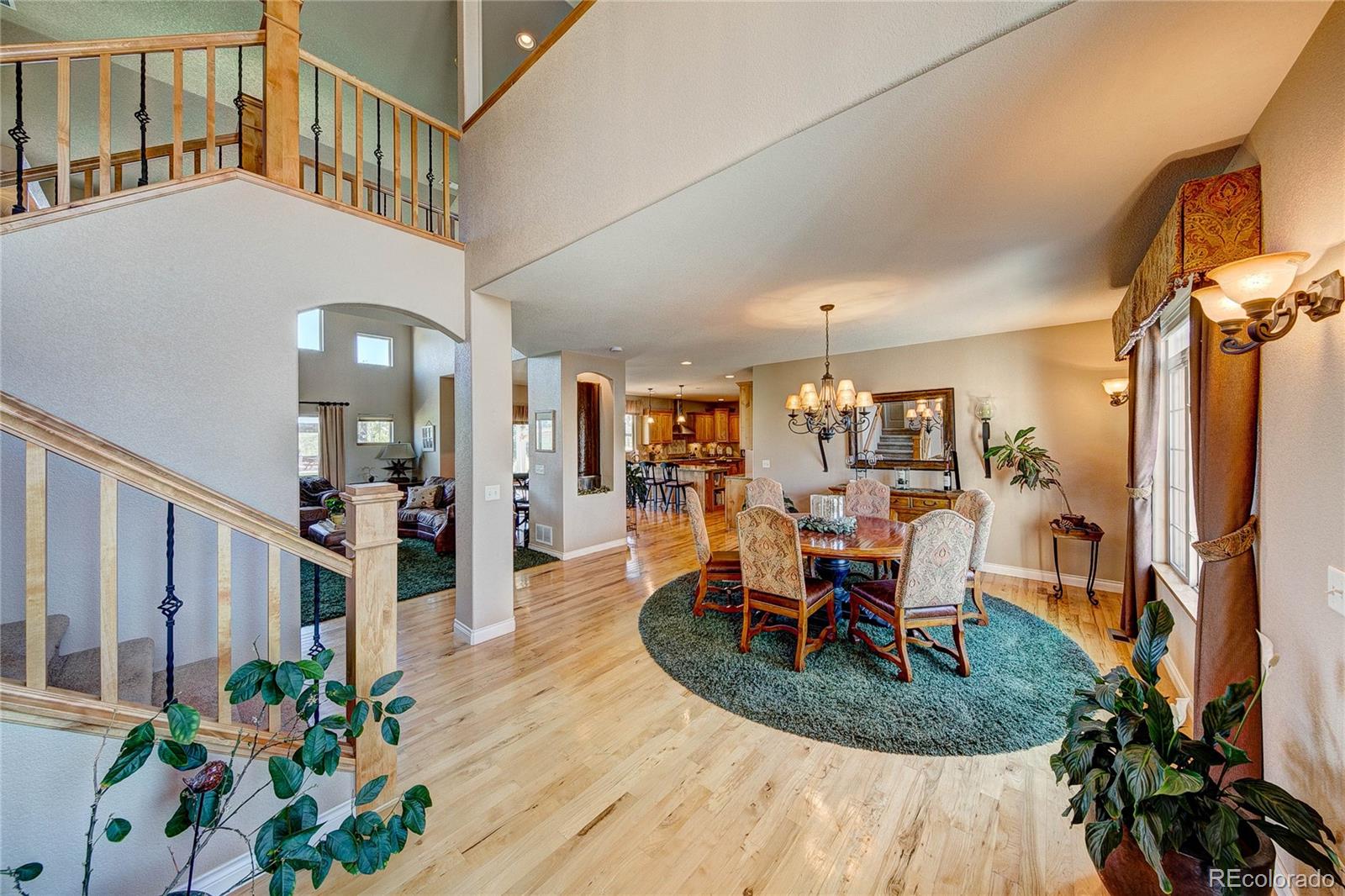 37053 Soaring Eagle Circle Severance, CO 80550 - Photo 11 of 35 a view of a livingroom with dining room and furniture