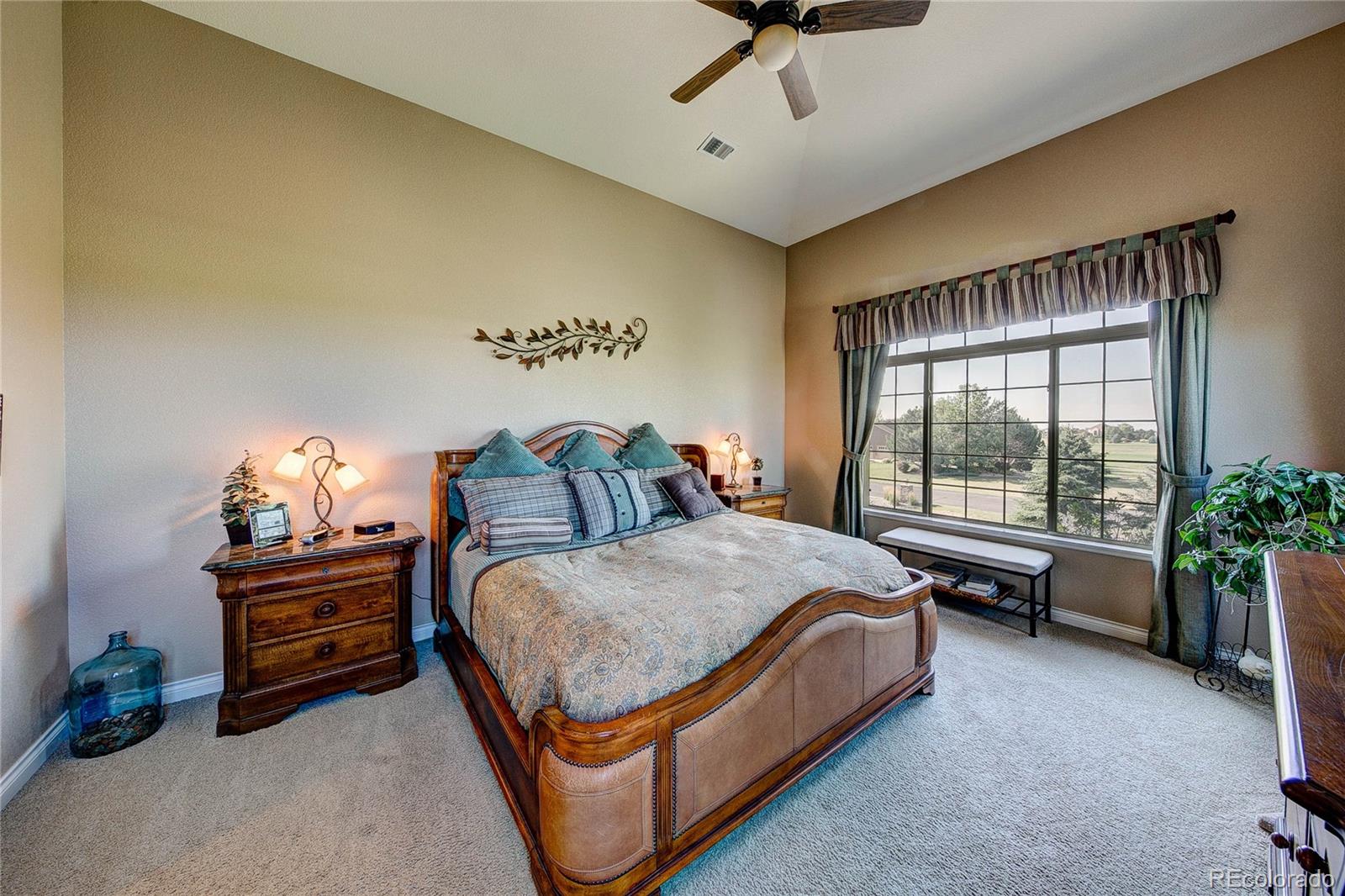 37053 Soaring Eagle Circle Severance, CO 80550 - Photo 18 of 35 a bed room with a bed and a window