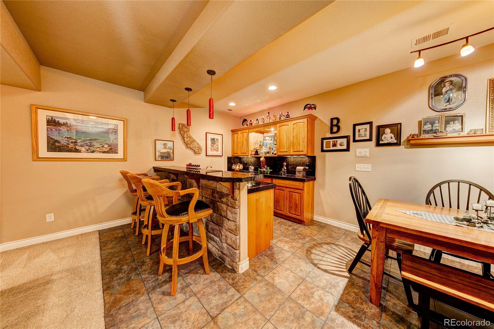 37053 Soaring Eagle Circle Severance, CO 80550 - Photo 28 of 35 a dining room with furniture and entryway