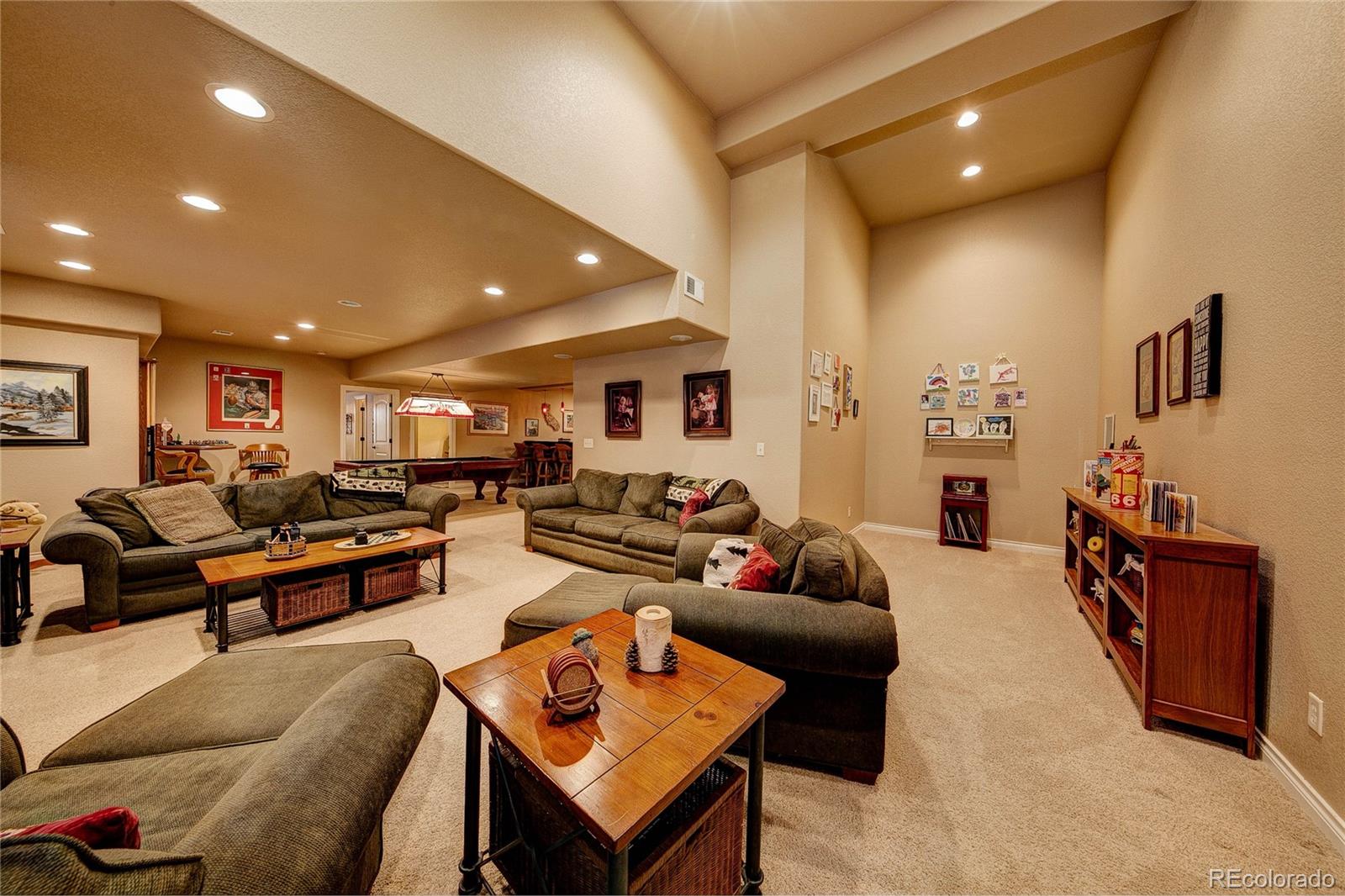 37053 Soaring Eagle Circle Severance, CO 80550 - Photo 30 of 35 a living room with furniture and wooden floor
