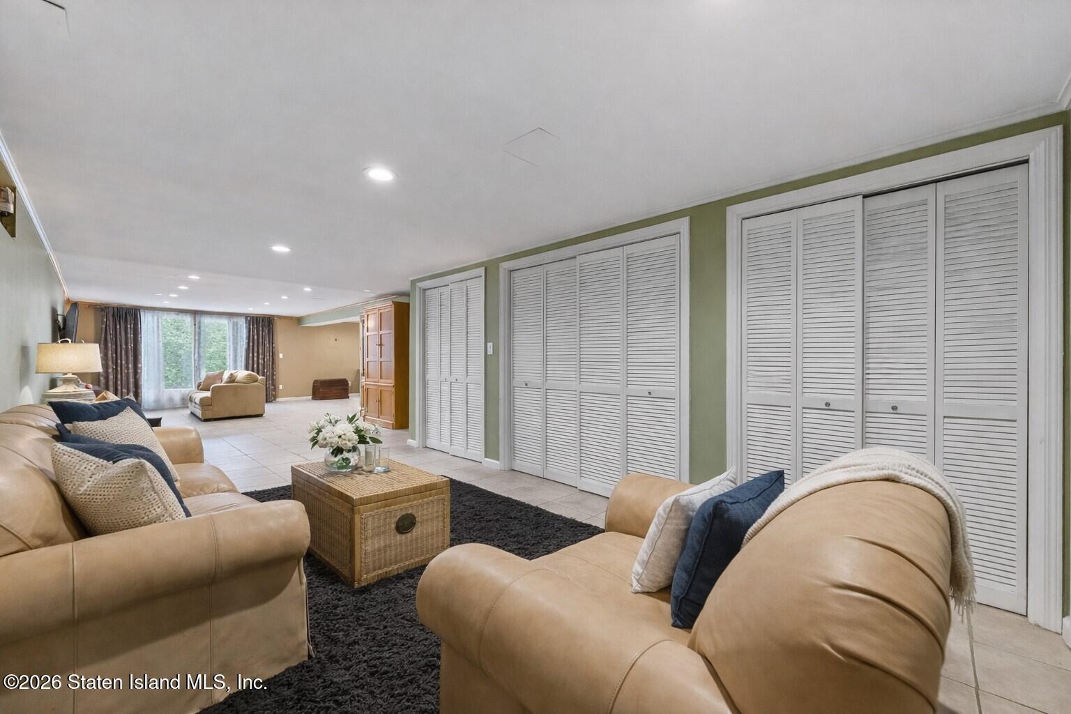 70 Woodvale Loop Staten Island, NY 10309 - Photo 38 of 58 BASEMENT-001_LIVING_RM