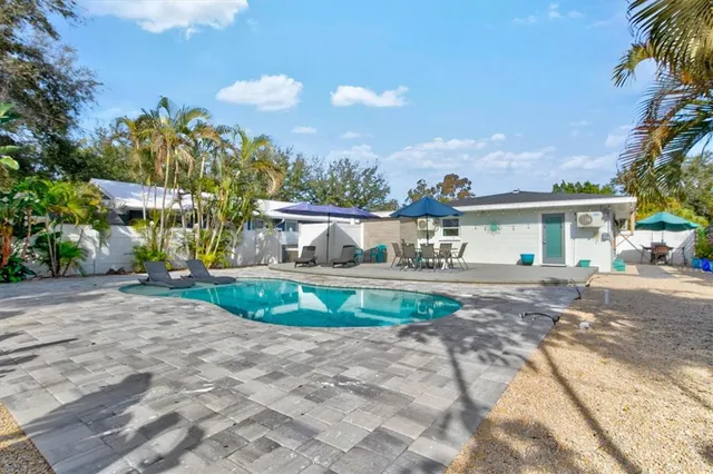 a view of a building with sitting area