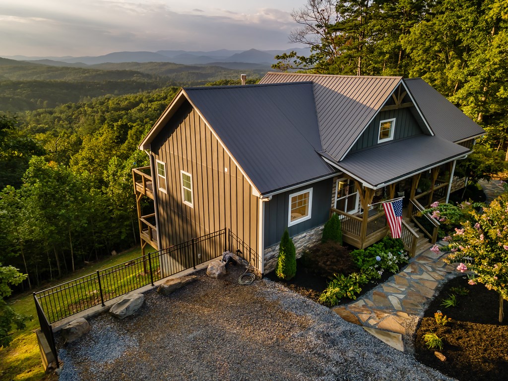 280 Skyland Trail Murphy, NC 28906 - Photo 2 of 4 a view of a house with backyard and garden