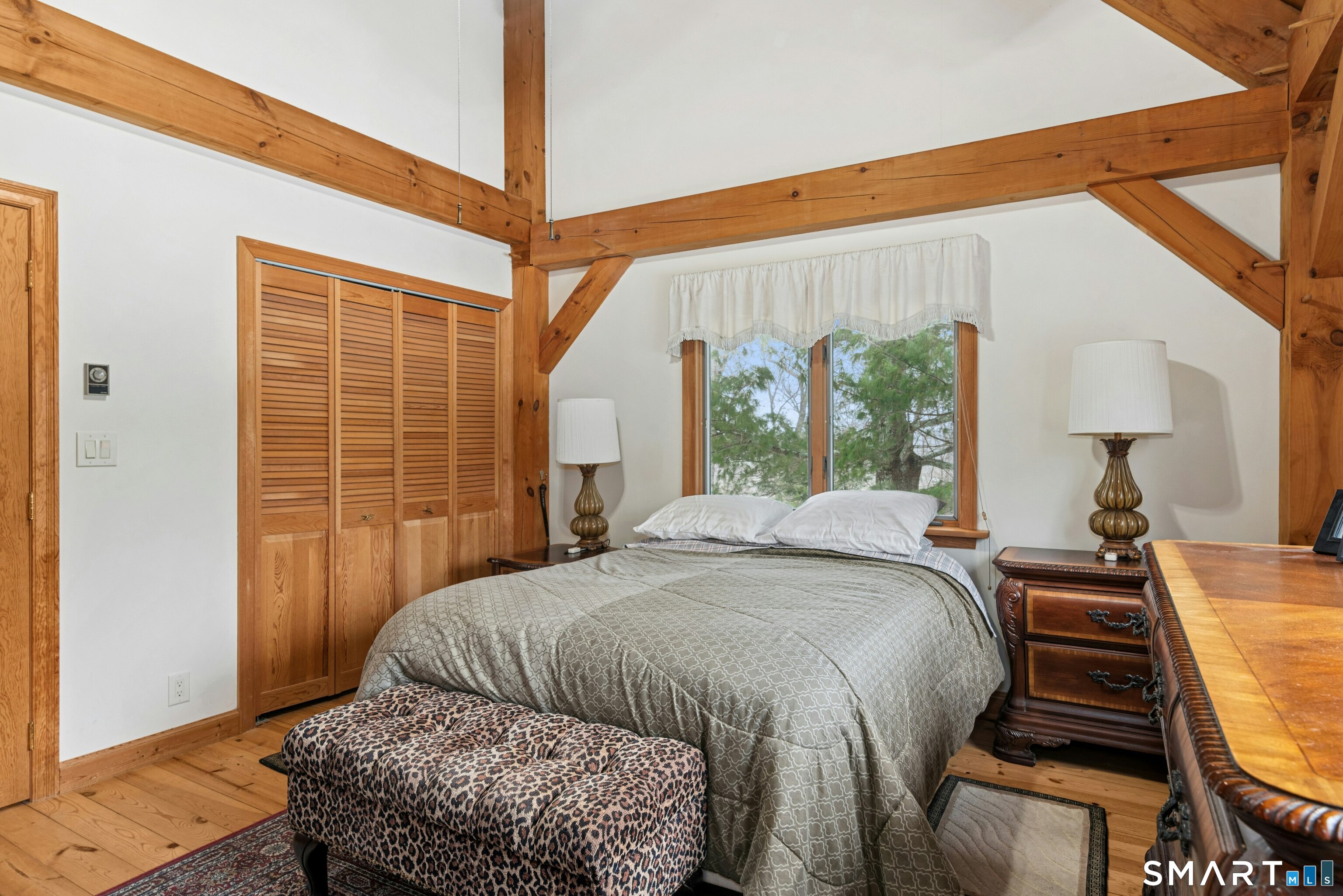 9 A Obtuse Rocks Road Brookfield, CT 06804 - Photo 18 of 36 a bedroom with a bed and window