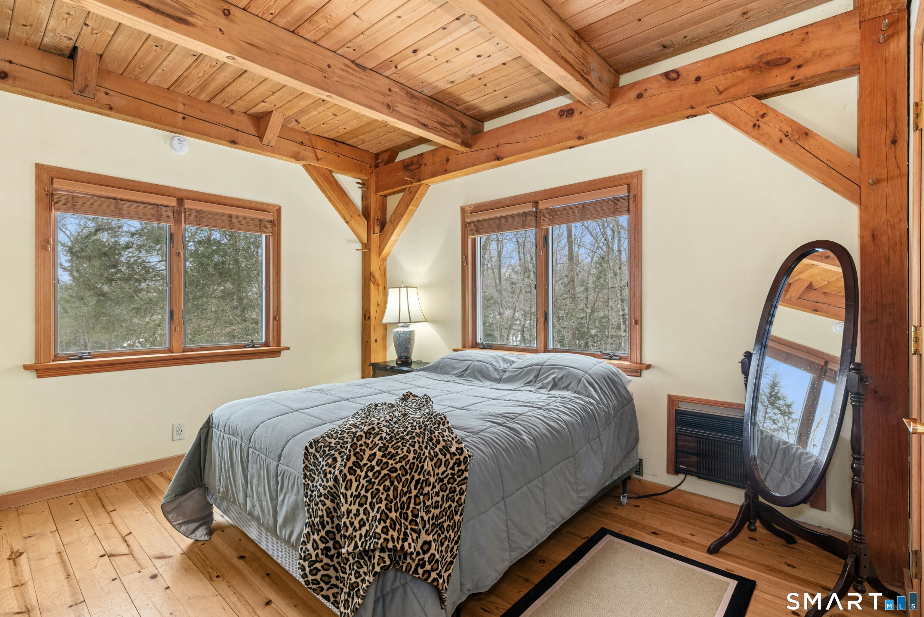 9 A Obtuse Rocks Road Brookfield, CT 06804 - Photo 21 of 36 a bedroom with a bed next to a window