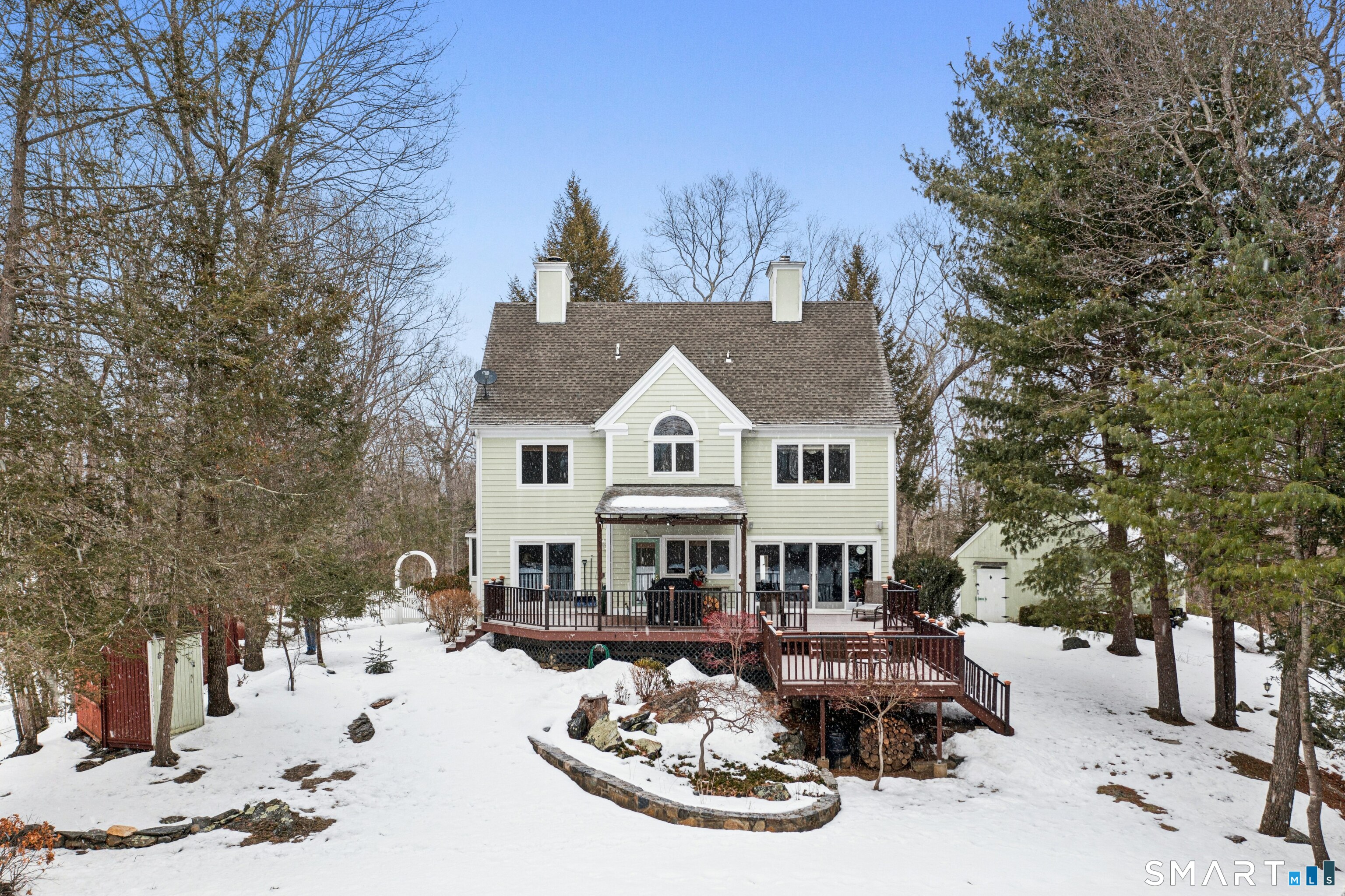 9 A Obtuse Rocks Road Brookfield, CT 06804 - Photo 28 of 36 a view of a white house with a large tree