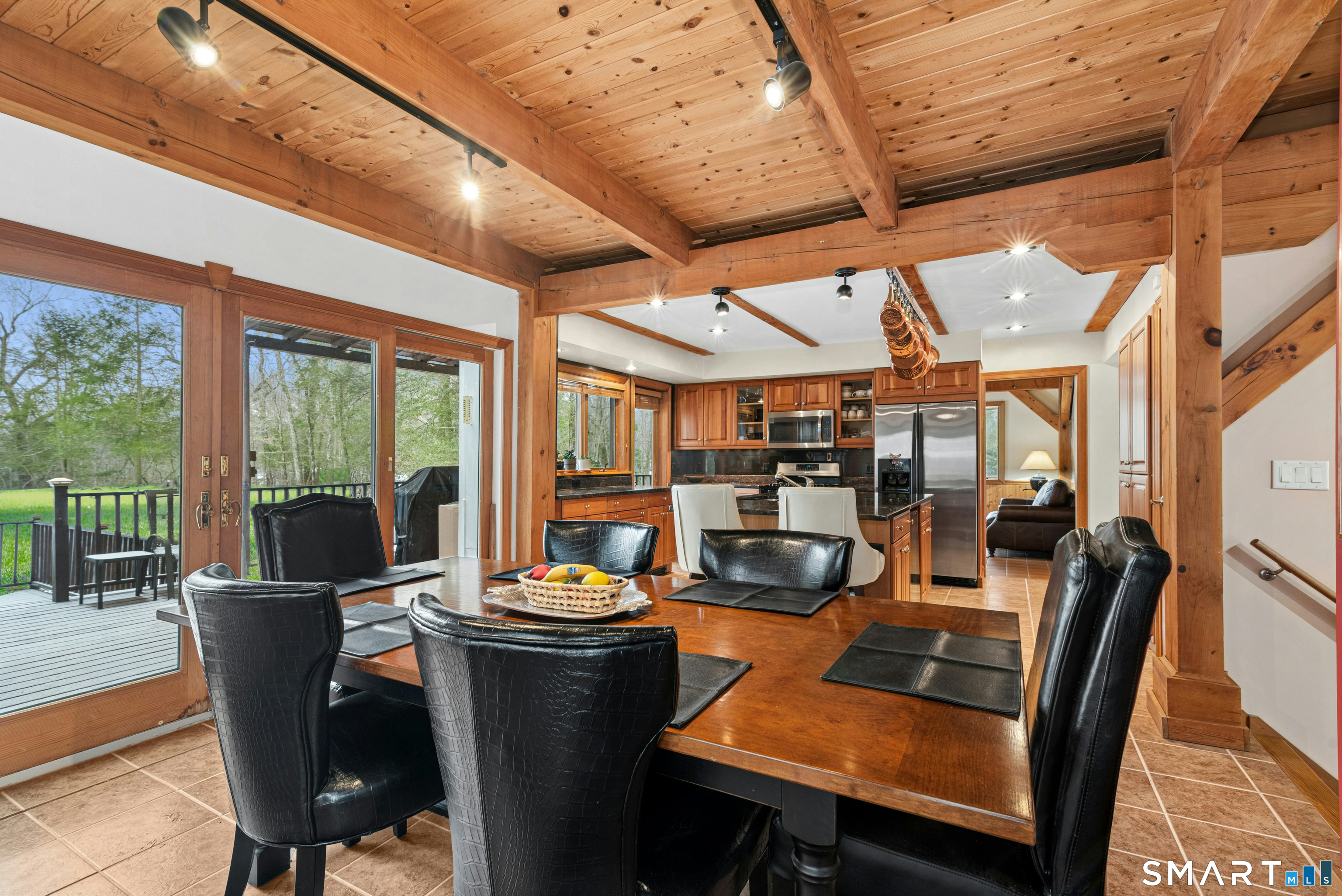 9 A Obtuse Rocks Road Brookfield, CT 06804 - Photo 8 of 36 a view of a dining room with furniture window and outside view