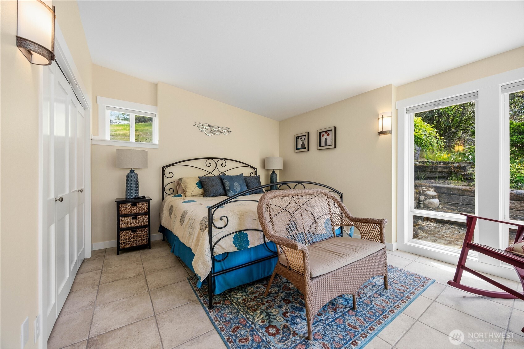 141 Sunset Place Manson, WA 98831 - Photo 25 of 38 a bedroom with a bed a table and chair
