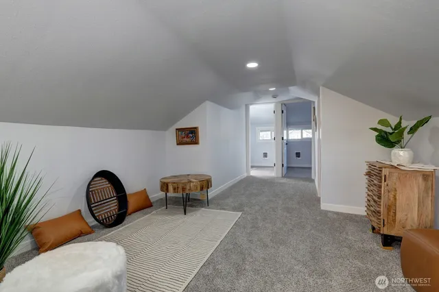 a view of a livingroom with furniture and front door