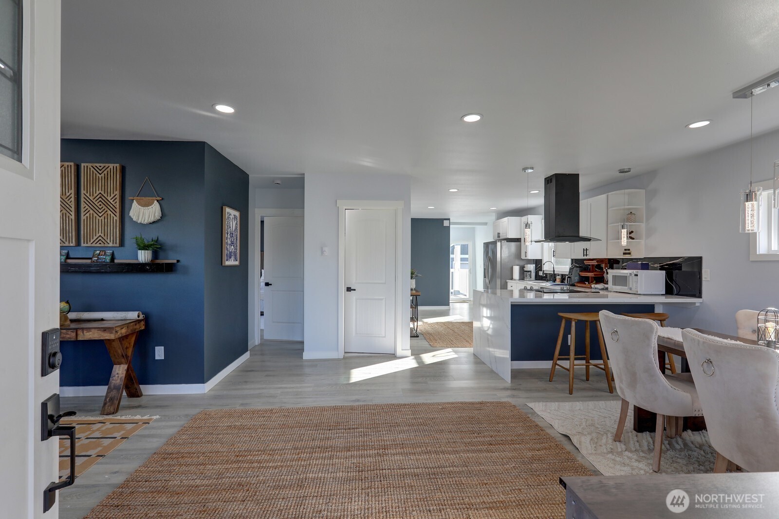 3217 South Durango Street Tacoma, WA 98409 - Photo 2 of 21 a living room with stainless steel appliances kitchen island granite countertop furniture and a view of kitchen