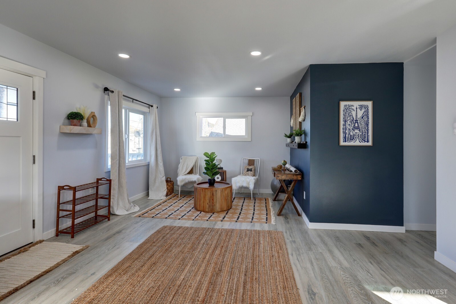 3217 South Durango Street Tacoma, WA 98409 - Photo 4 of 21 a living room with furniture and wooden floor