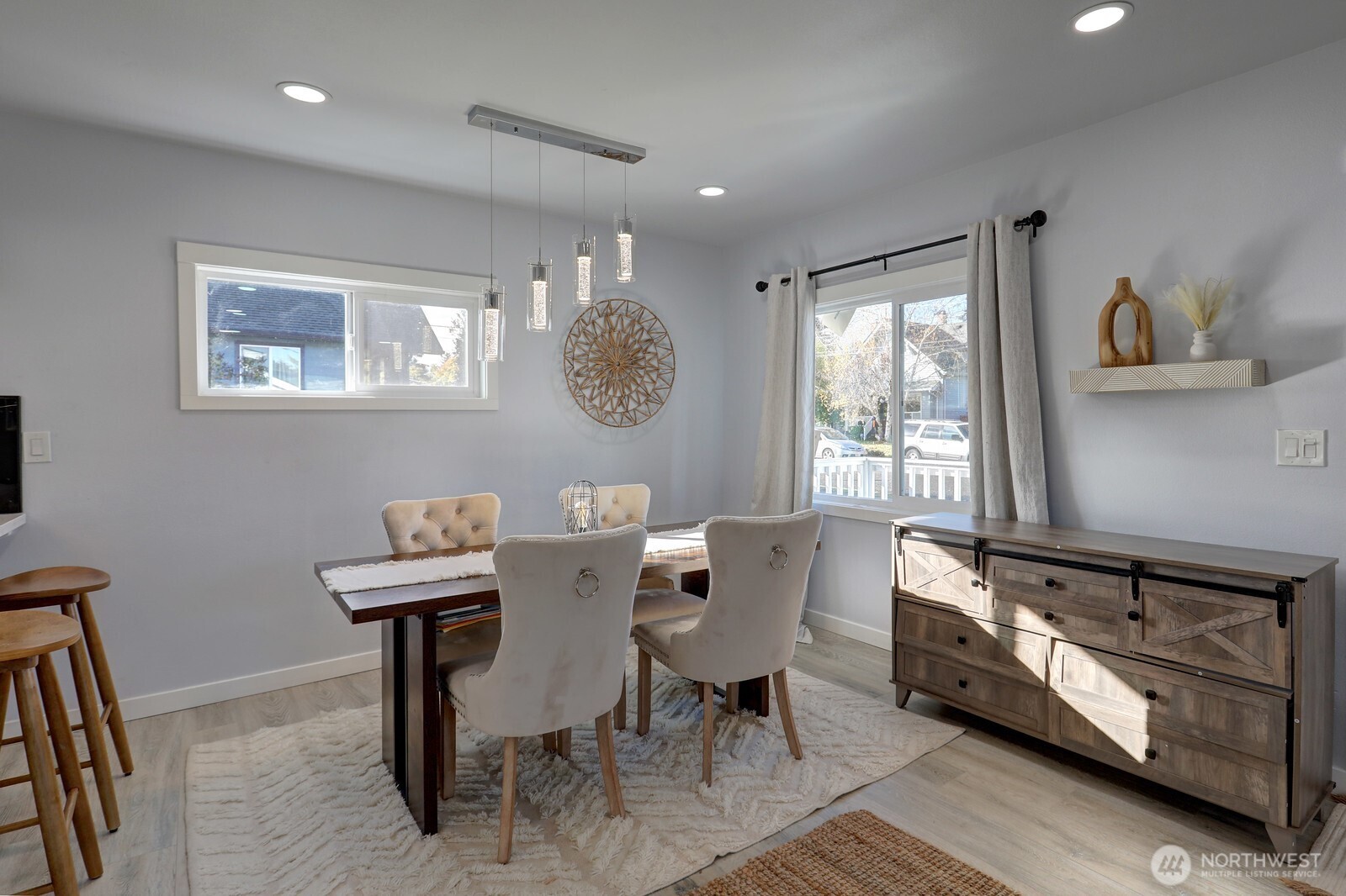 3217 South Durango Street Tacoma, WA 98409 - Photo 7 of 21 a view of a workspace with furniture and a window