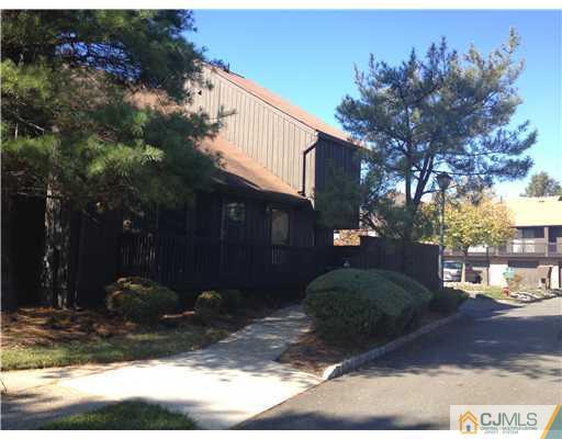 3 Westgate Drive Edison, NJ 08820 - Photo 2 of 14 a front view of a house with a yard