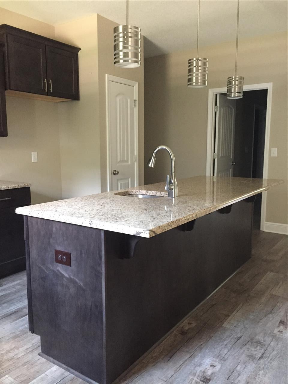 7153 Springhill Road Milton, FL 32570 - Photo 46 of 48 SINK AND ELECTRICAL IN ISLAND