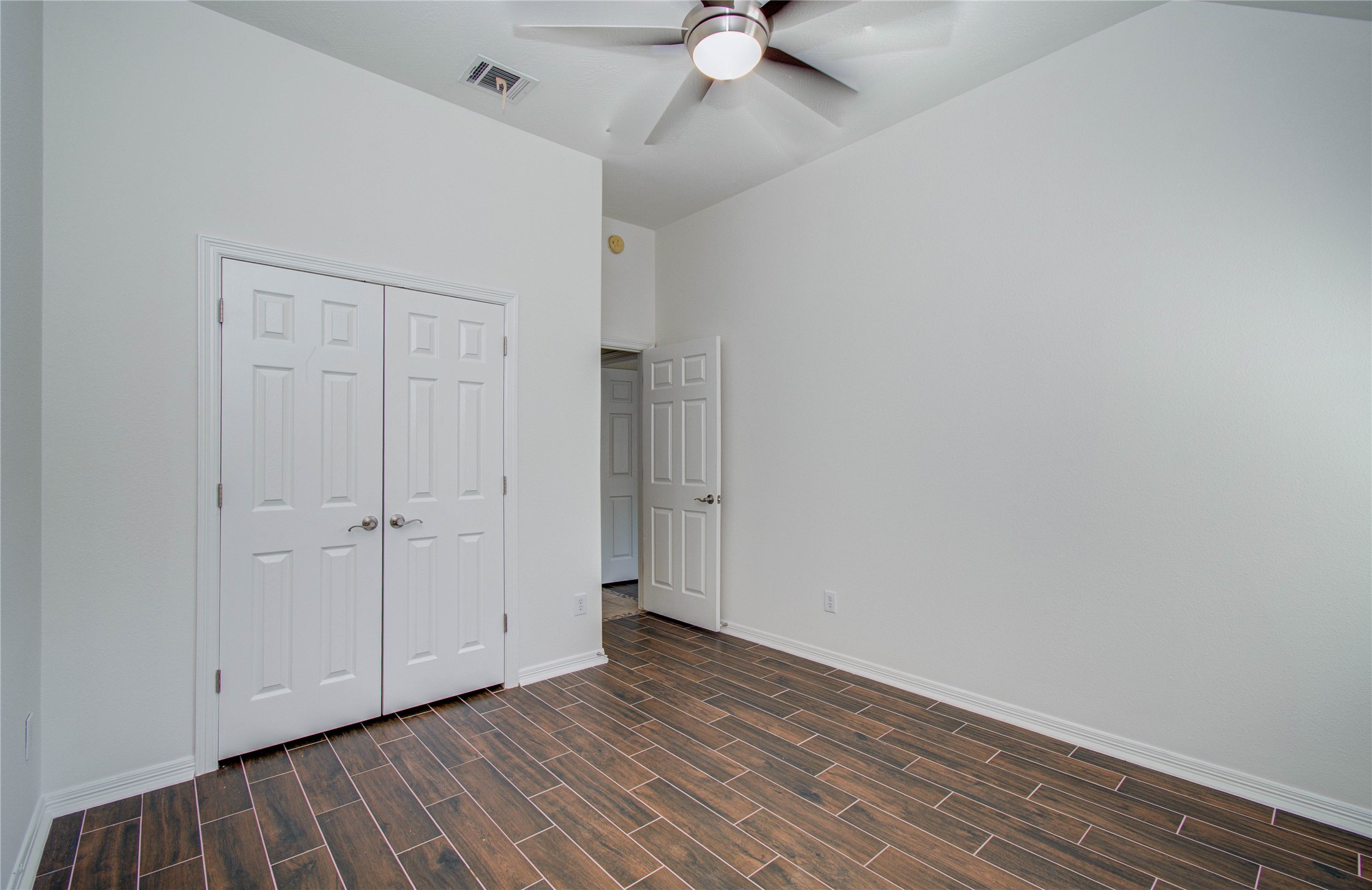 10714 Barker Lake Cypress, TX 77433 - Photo 15 of 43 a view of an empty room with a window
