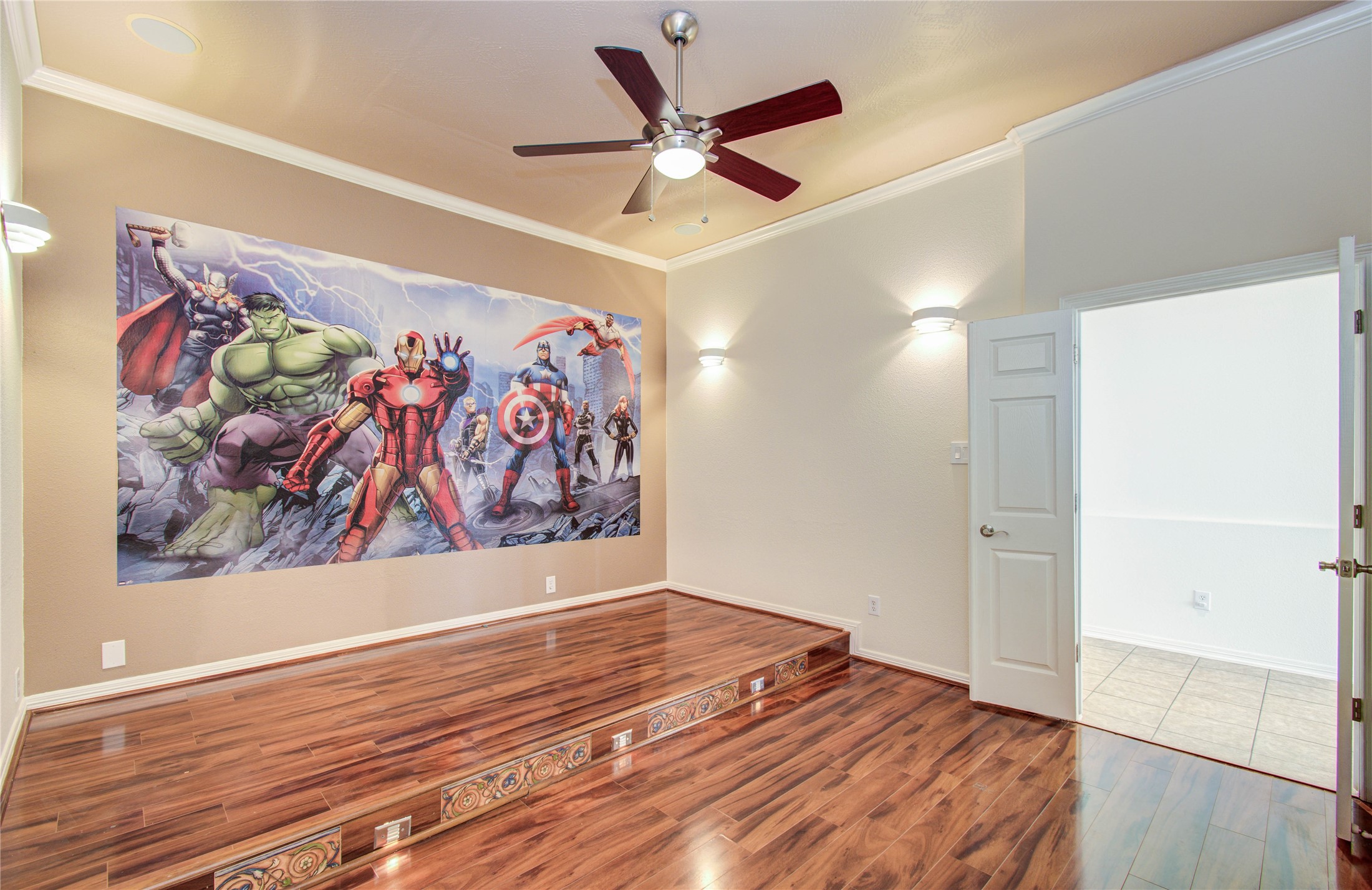 10714 Barker Lake Cypress, TX 77433 - Photo 19 of 43 an empty room with wooden floor and wall painting