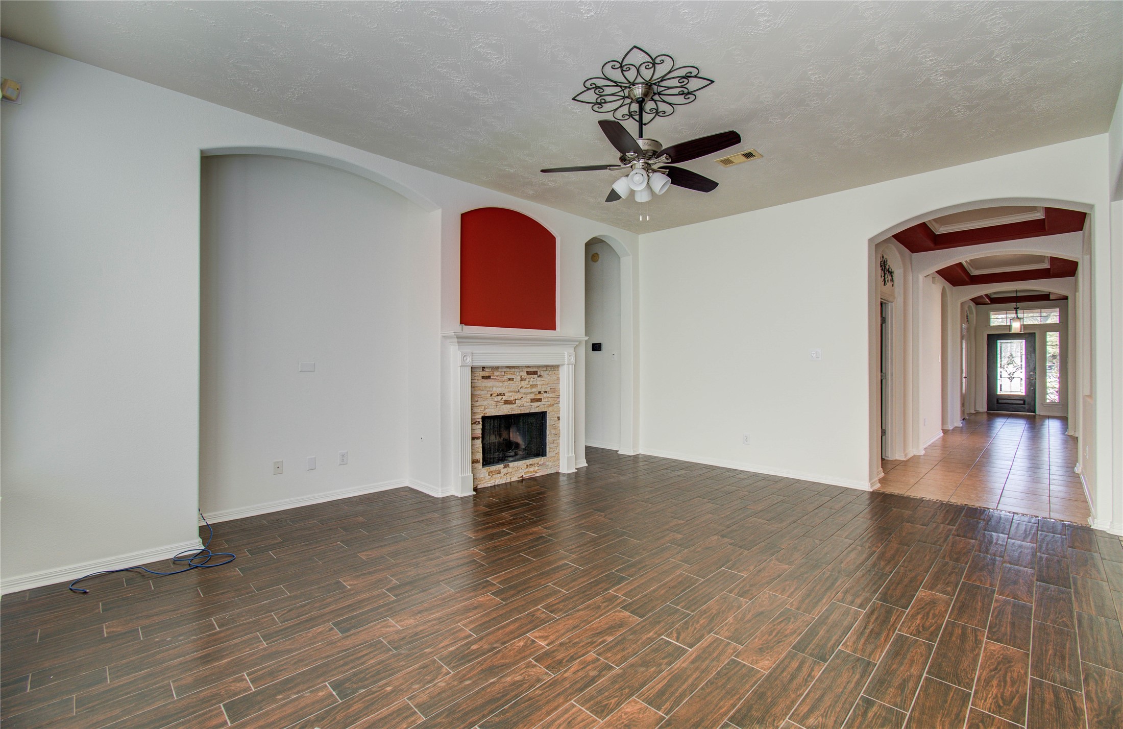 10714 Barker Lake Cypress, TX 77433 - Photo 21 of 43 a view of an empty room with wooden floor