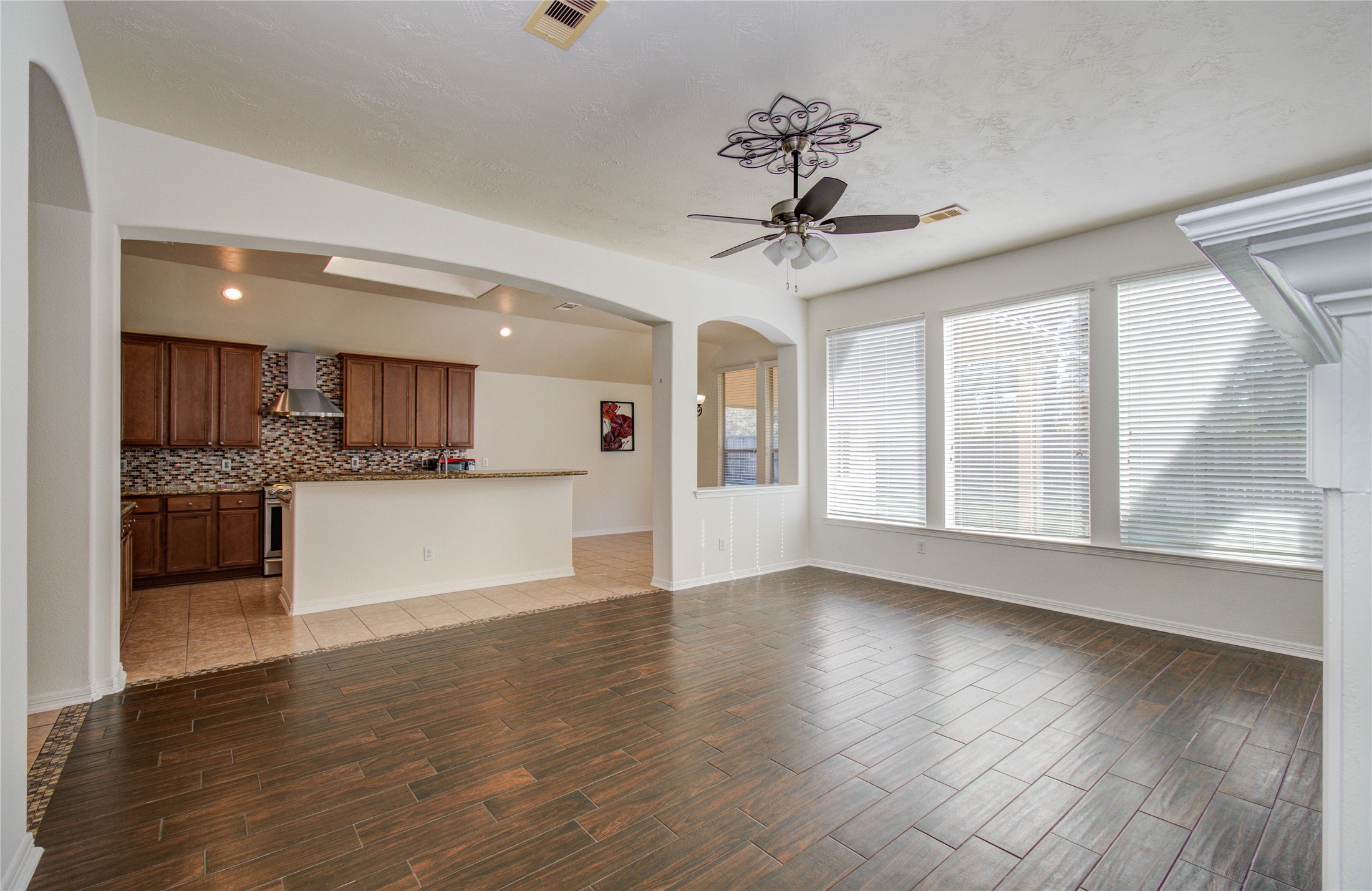 10714 Barker Lake Cypress, TX 77433 - Photo 23 of 43 a view of kitchen with refrigerator and window