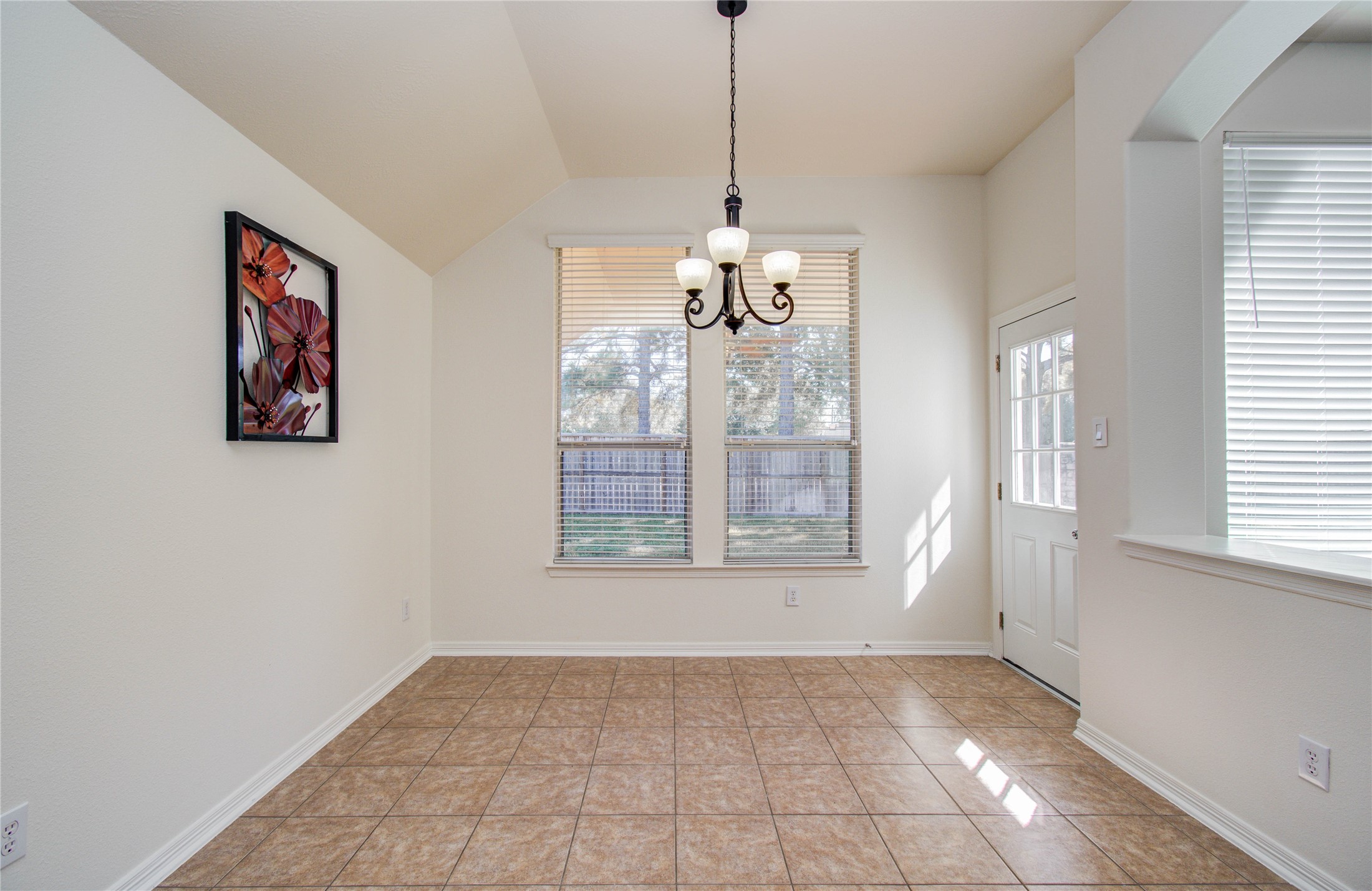 10714 Barker Lake Cypress, TX 77433 - Photo 32 of 43 a view of an empty room with a window