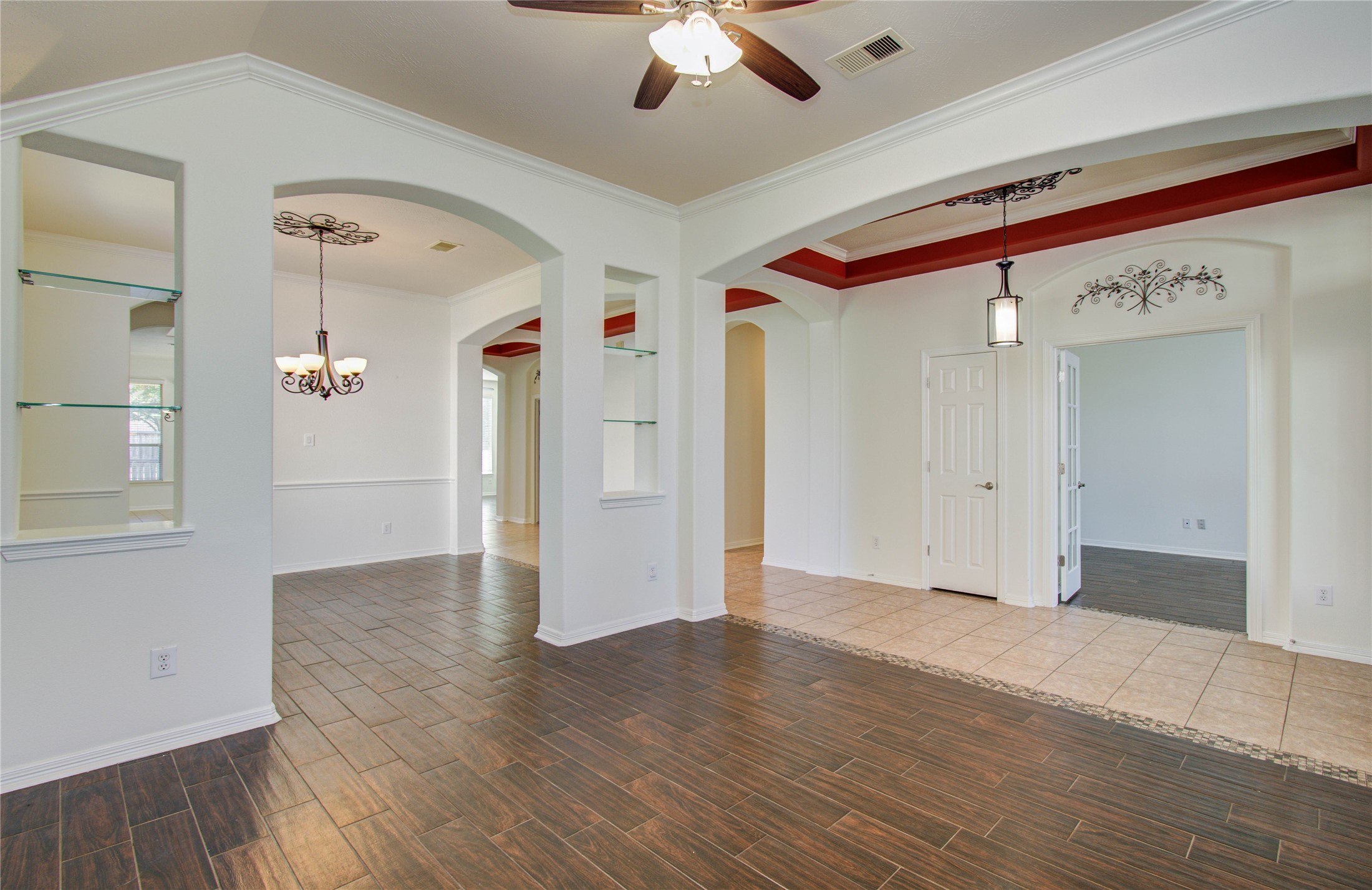 10714 Barker Lake Cypress, TX 77433 - Photo 5 of 43 a view of a hallway with wooden floor