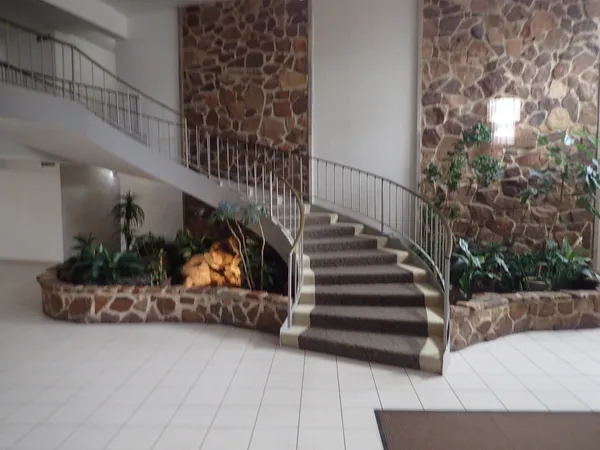 a view of entryway with a front door