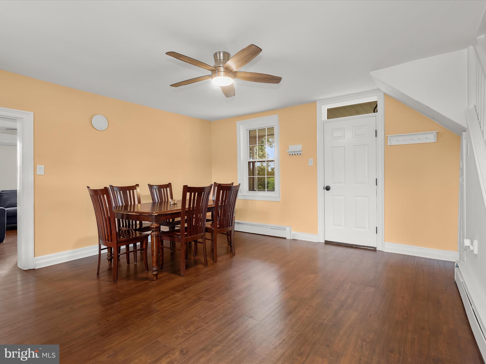 1530 Bowersox Road New Windsor, MD 21776 - Photo 12 of 97 a view of a dining room with furniture and wooden floor