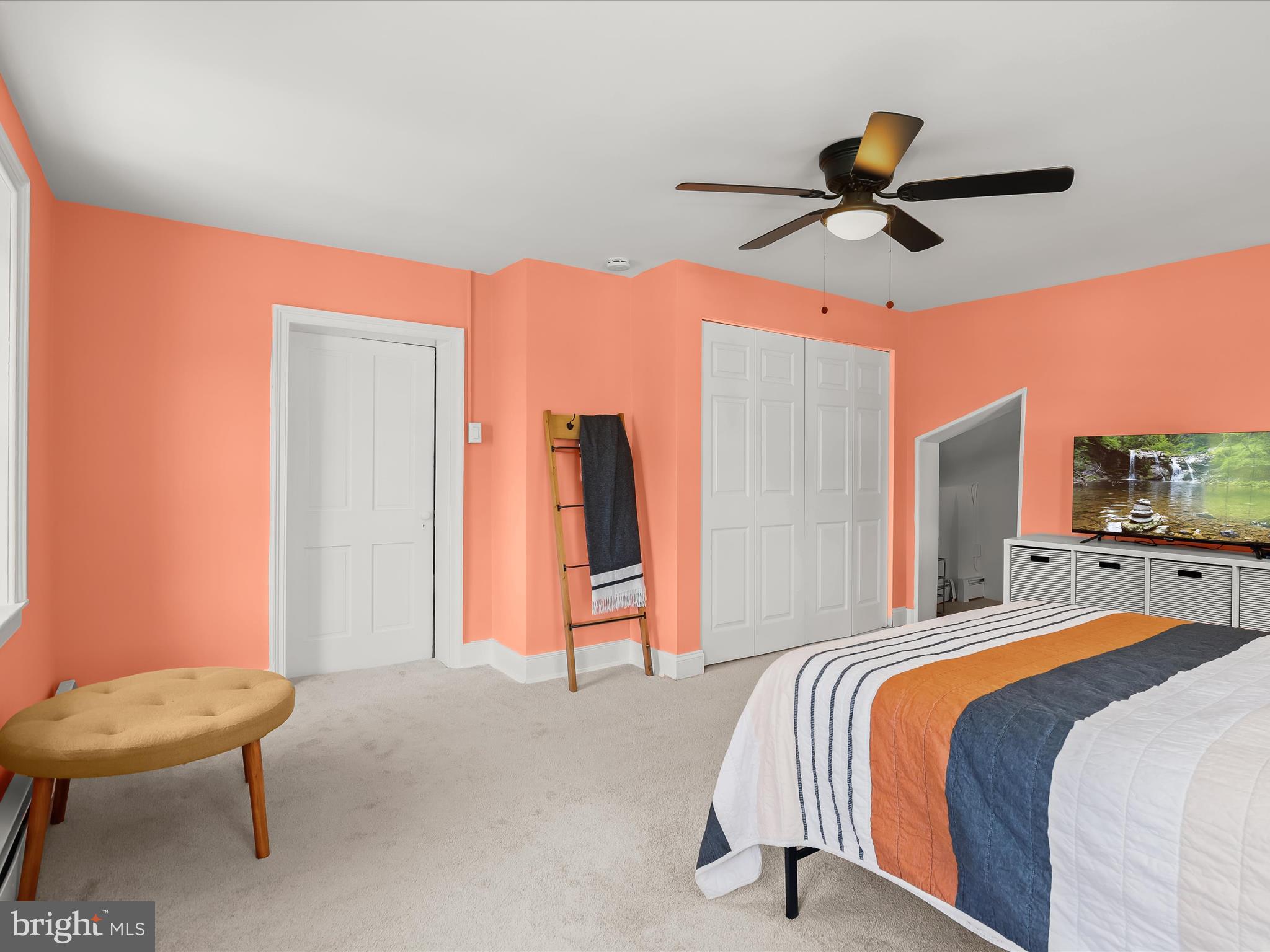 1530 Bowersox Road New Windsor, MD 21776 - Photo 24 of 97 a bedroom with a bed and a chandelier