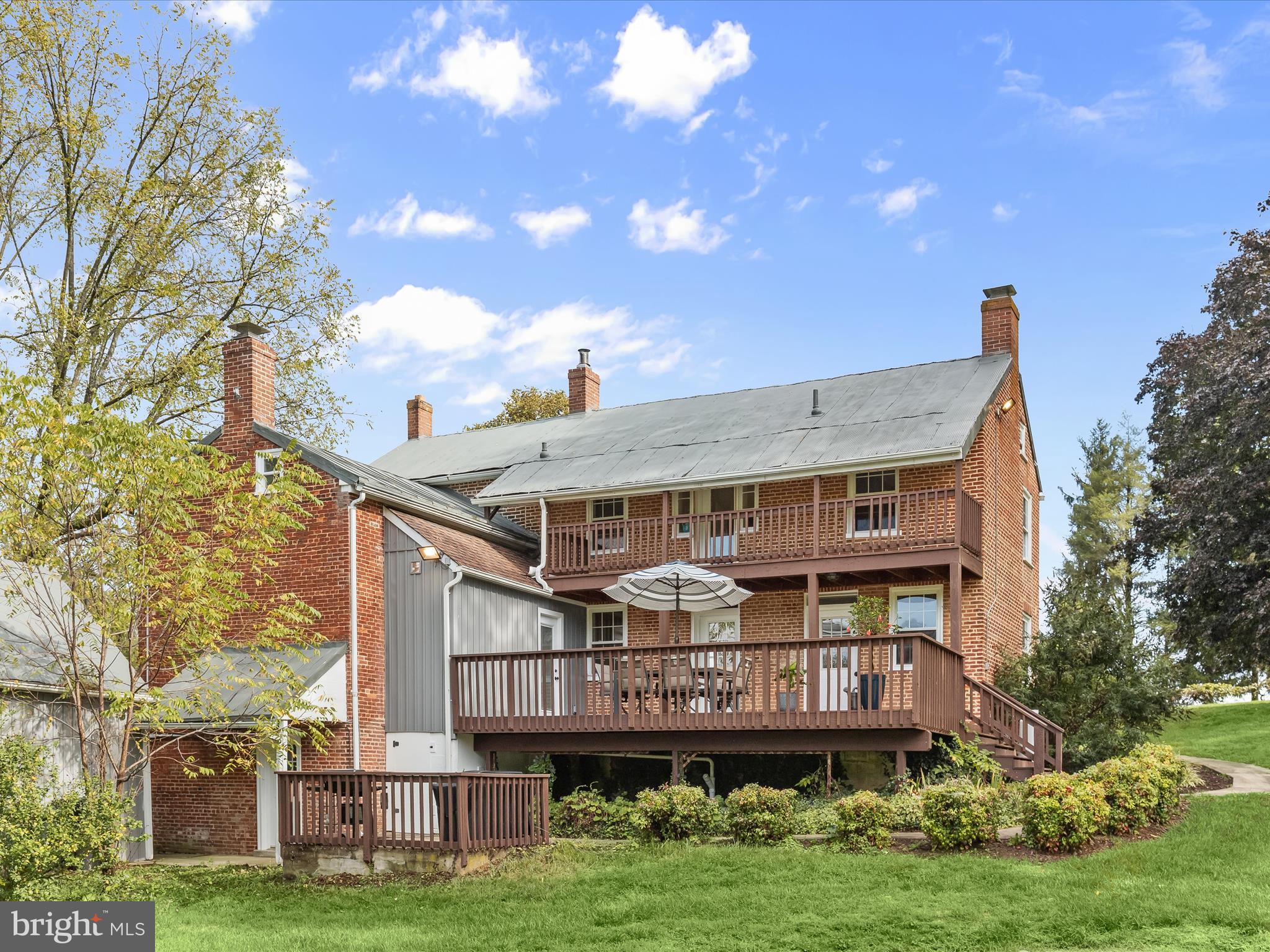 1530 Bowersox Road New Windsor, MD 21776 - Photo 43 of 97 a view of a house with a big yard and large tree