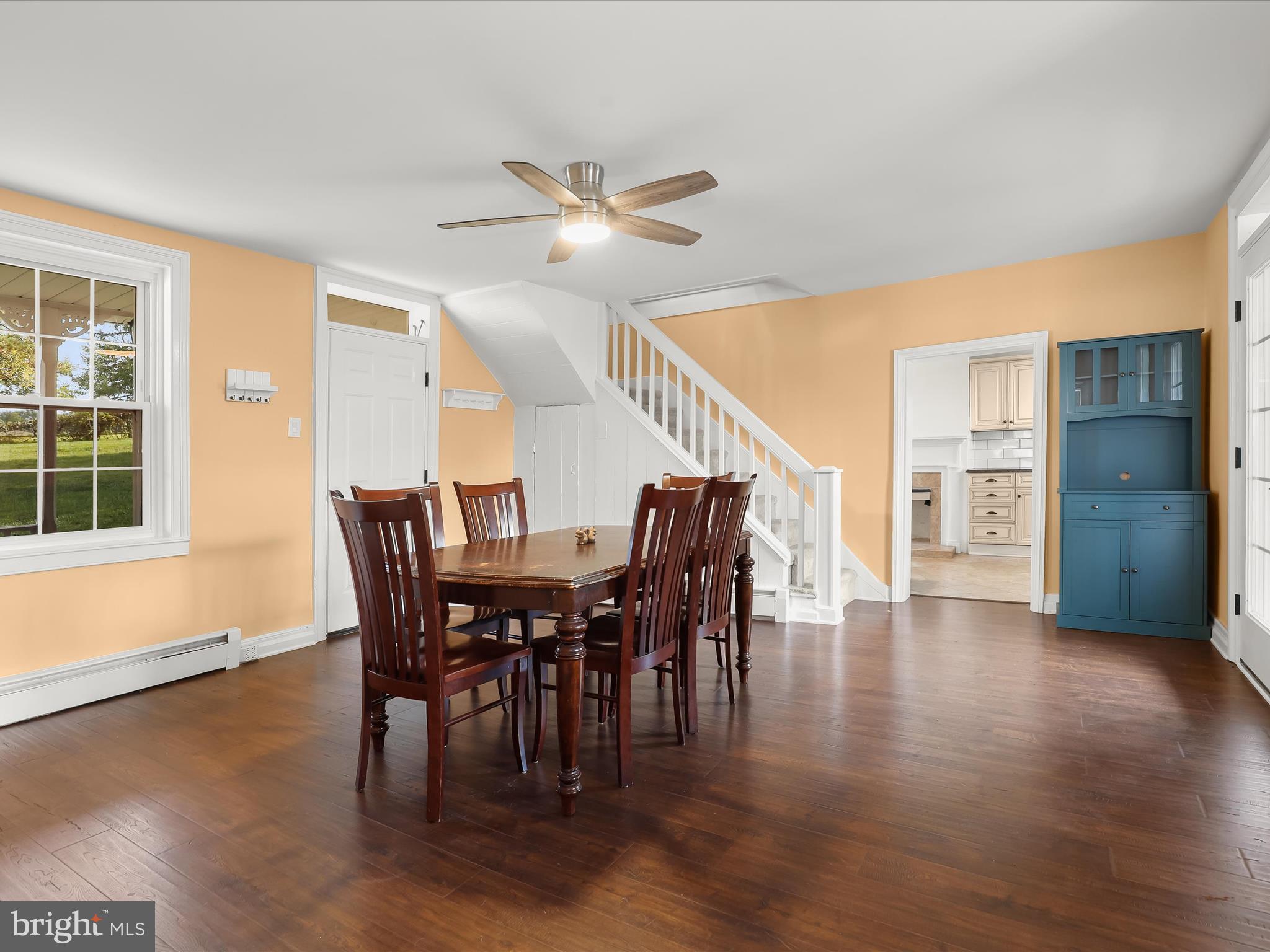 1530 Bowersox Road New Windsor, MD 21776 - Photo 8 of 97 a view of a dining room with furniture window and wooden floor