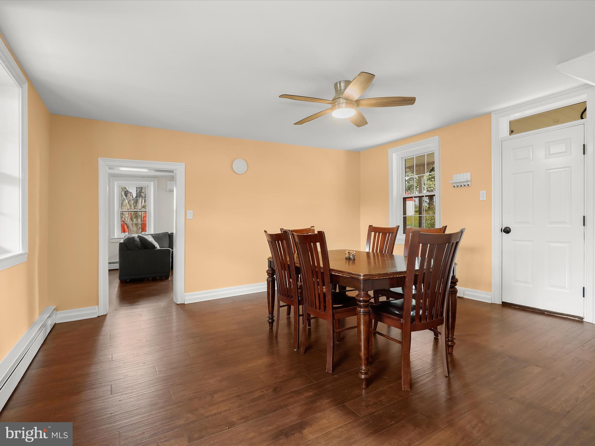 1530 Bowersox Road New Windsor, MD 21776 - Photo 10 of 97 a view of a dining room with furniture and wooden floor