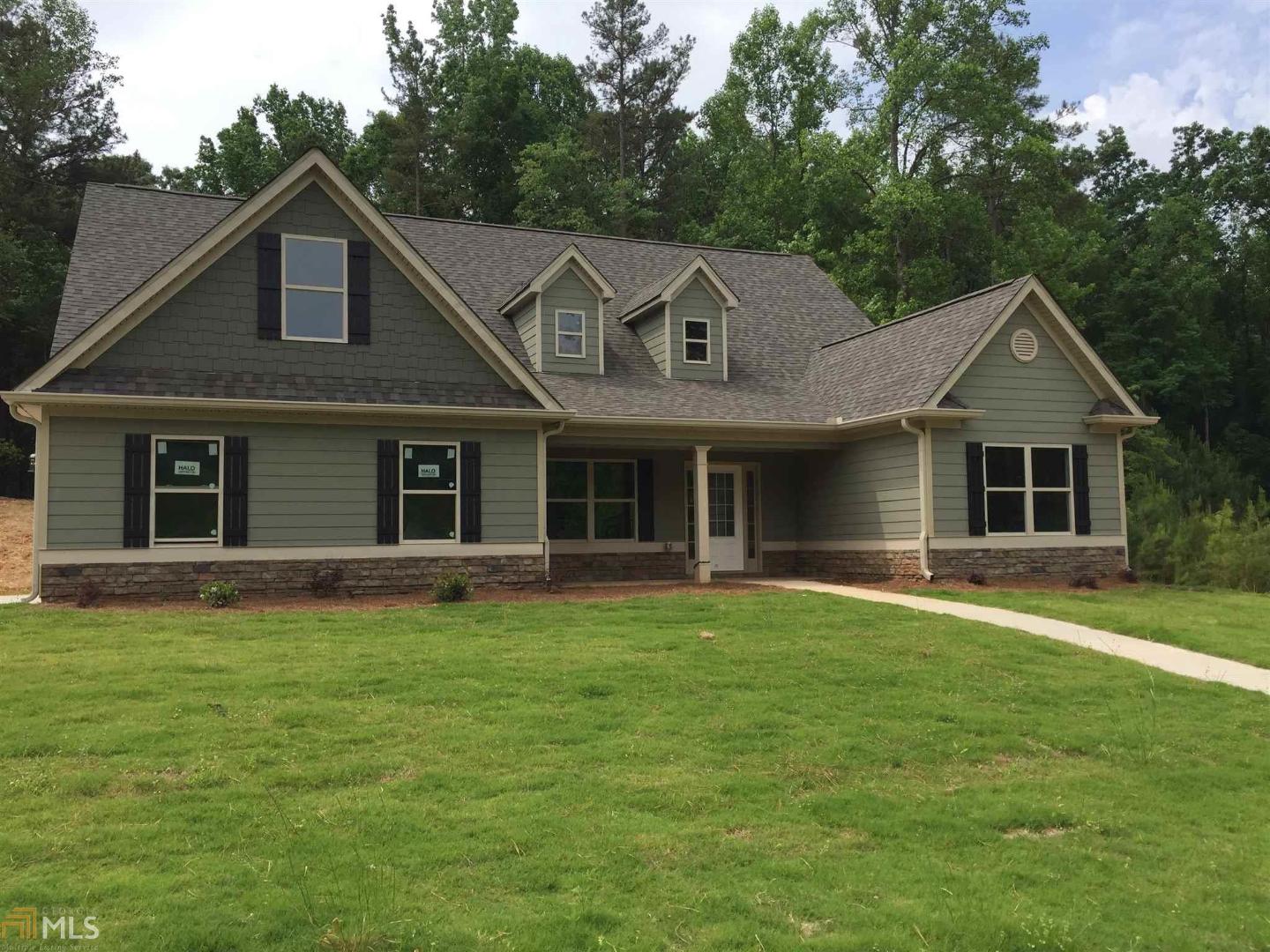 141 Courtland Road, Unit 47 Jefferson, GA 30549 - Photo 1 of 1 a front view of a house with a garden
