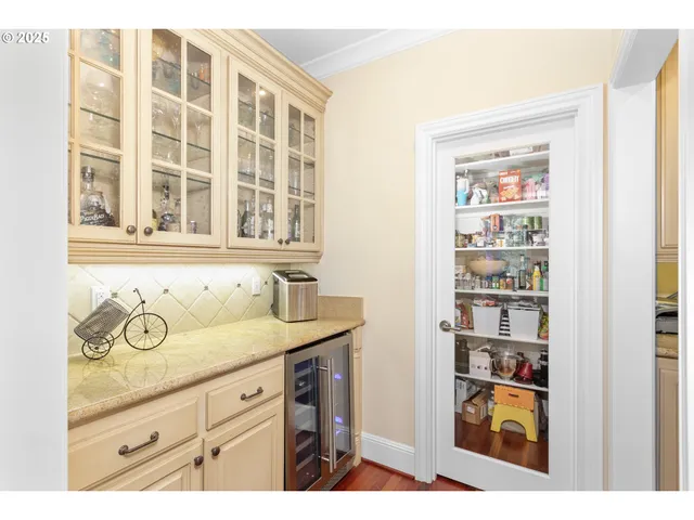 a bathroom with a sink and a cabinet