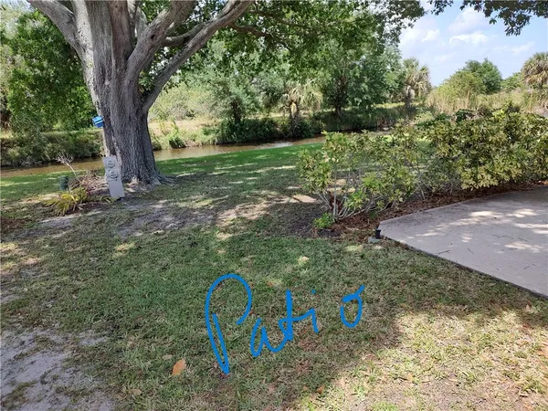 a view of backyard with outdoor space