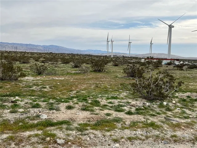 a view of a water covered with fog