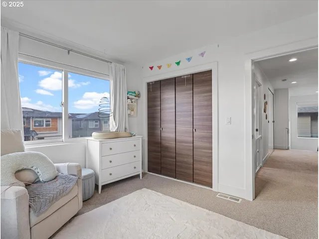 a bathroom with a double vanity sink toilet and shower