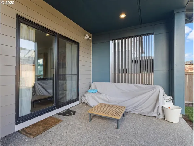 a view of a big house with a swimming pool and a yard