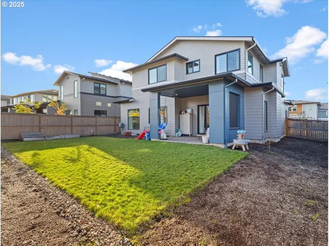 a view of a house with a yard porch and sitting area