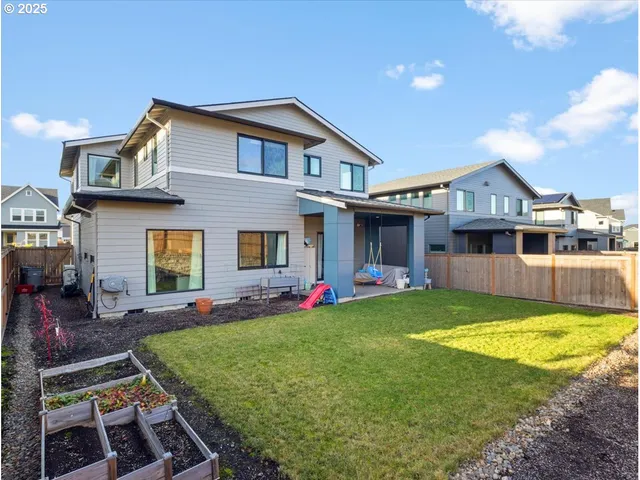 a view of backyard with trampoline