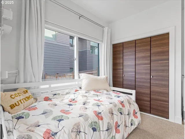 a view of a hallway view with wooden floor and furniture