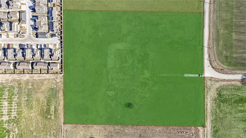 a view of swimming pool from a balcony