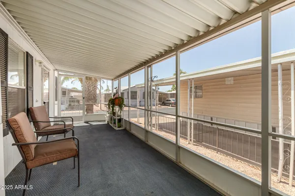 a view of living room with balcony